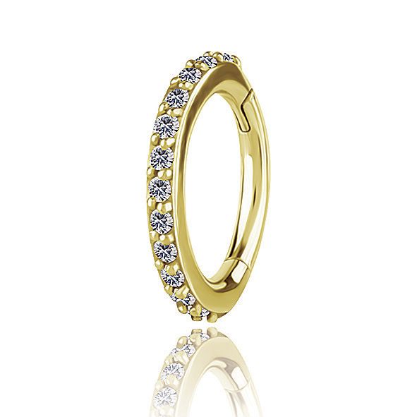 Golden oval ring for the rook piercing