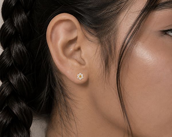 MASSIVES GOLD-LABRET MIT KRISTALLBLÜMCHEN
