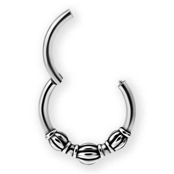Piercing clicker avec 3 boules en style ethnique
