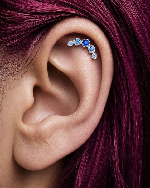 LABRET CON ARCO DE CRISTALES AZULES