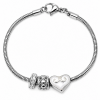 BRACELET AVEC CŒUR ET BRELOQUES