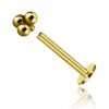 Golden labret piercing with trinity of spheres