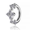 Oval navel piercing with crystal flowers