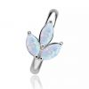 Navel piercing with opal lotus flower