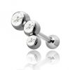 Tragus piercing with three small crystals