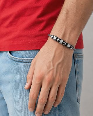 STAHLARMBAND MIT ACCESSOIRES
