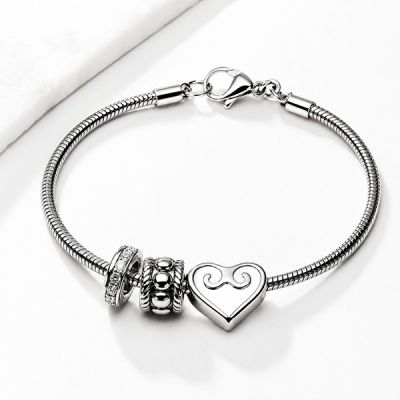BRACCIALE CON CUORE E ACCESSORI