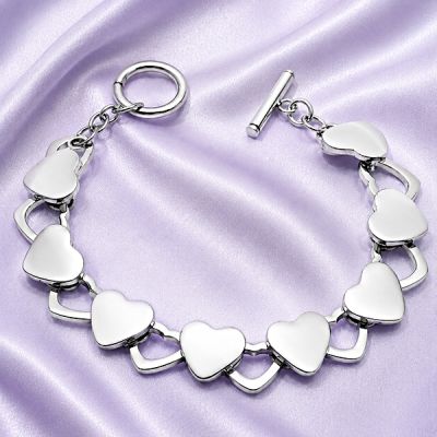 ARMBAND MIT KLEINEN HERZEN
